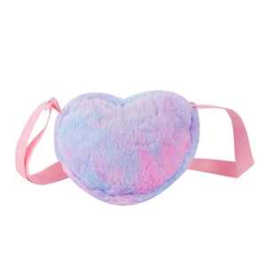 Detail of heart-shaped plush crossbody bag featuring colorful tie-dye faux fur and strap