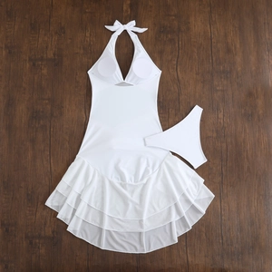Detailed view of white bikini set featuring triple-layered mesh skirt and halter neck top