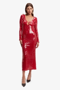 Detail of red sequin long sleeve dress featuring deep V-neck and delicate lace-up detail