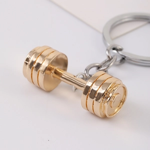 Golden dumbbell keychain for fitness lovers made of high-quality polished alloy metal