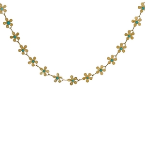 Elegante collana in titanio dorato con pendenti floreali e perline blu su bianco