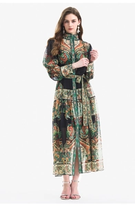Detail of vintage paisley print dress with lantern sleeves and waist tie belt