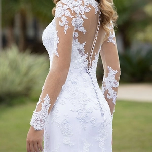 Elegant mermaid lace wedding dress with long sleeves and detailed buttoned open back