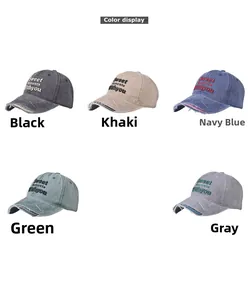 Close-up of vintage washed baseball caps featuring embroidered text and distressed brims