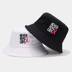 Never Give Up letter embroidery bucket hat in black and white cotton with pink ribbon