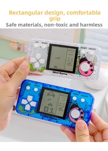 Macro detail of portable mini retro game consoles with glitter finish and LCD screen