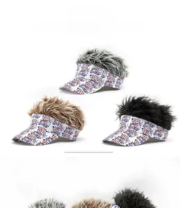 Detail of three creative baseball caps featuring colorful spiked wigs and graphic prints