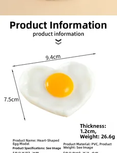 Detailed view of heart-shaped PVC fried egg keychain with dimensions and specifications