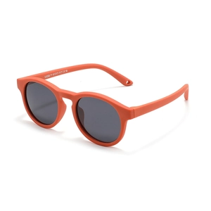 Orange kids silicone sunglasses for babies 0-3 years with UV protection 45 degree view