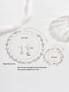 Detail view of crystal bridal jewelry set with necklace, earrings and bracelet dimensions
