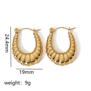 Detail view of 18K gold plated croissant earrings with dimensions 24.4mm and 19mm