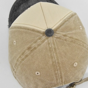 Top view of vintage washed cotton baseball cap with two-tone design and fine stitching