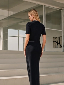 Slim fit black knitted maxi dress with turn-down collar and short sleeves in minimalist style
