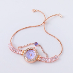 Detail of rose gold bracelet watch with purple dial and pink crystal square links