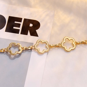 Fashionable gold metal waist chain with hollow flower link design for women dresses