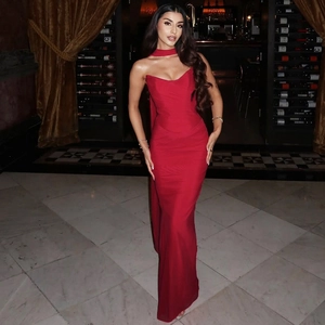 Close-up of elegant red double-layer mesh bodycon evening gown with matching neck accessory
