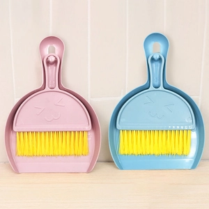 Mini desktop cleaning set with pink and blue smile brooms and dustpan kits