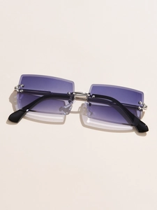 Detail view of rimless rectangle sunglasses with purple gradient lenses and silver bridge