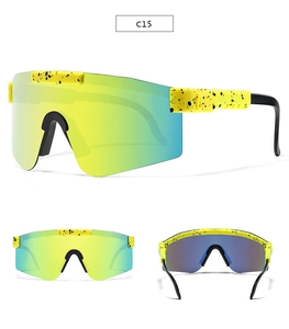 Three-way view of yellow sports sunglasses with black splatter frame and gradient lenses