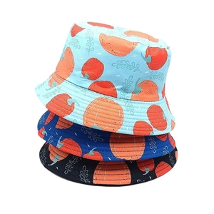 Chapeau bob réversible pour enfants avec motifs citrouilles en bleu clair, bleu et noir