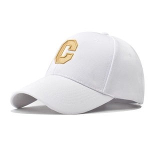 Classic white baseball cap with large golden embroidered C letter from a 45-degree angle
