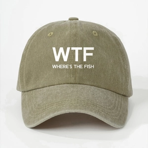 Detailed view of olive green washed canvas baseball cap with WTF fish printed design