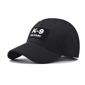 Tactical black baseball cap with K-9 MILITARY embroidery shown from a 45-degree angle