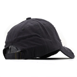 Detailed back view of vintage distressed black baseball cap with metal buckle strap