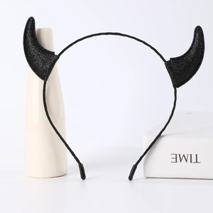 Glittery black devil horn headband for Halloween costumes on a white background