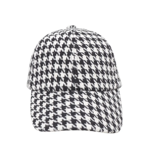 Classic black and white houndstooth baseball cap with a vintage fashion curved brim