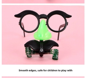 Funny disguise glasses set with large nose, mustache, and green party blower details