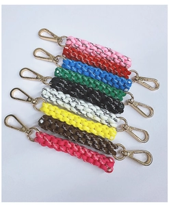 Detailed view of colorful handmade braided rope keychains with gold metal lobster clasps