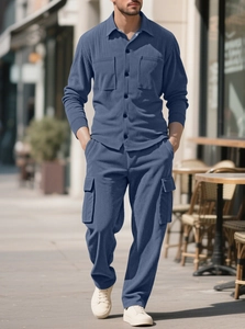 Detail of blue corduroy texture on men's casual shirt and cargo pants workwear set