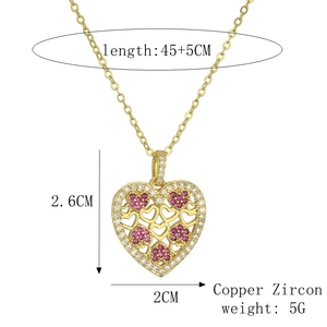 Detailed view of gold plated heart pendant with red zircon flowers and size dimensions