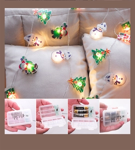 Détail du boîtier à piles de la guirlande LED de Noël montrant les neuf modes d'éclairage