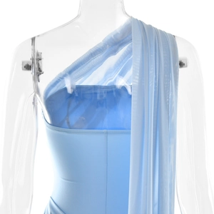 Detail of light blue bodycon dress featuring sheer mesh draping on the shoulder
