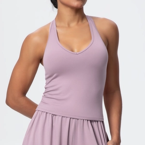 Dusty pink V-neck yoga tank top and pleated sports skirt set with brushed matte texture