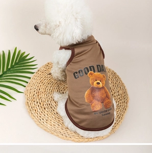 Detail view of breathable brown mesh dog vest featuring teddy bear and GOOD DAY print