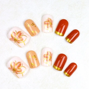 Französisches künstliches Nägel-Set mit Blumenmustern, Goldfolie und 10 Stück im Set
