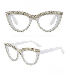Front and side views of white cat-eye reading glasses with luxury rhinestone detailing