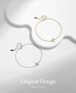 Close-up of gold and silver S925 sterling silver four-leaf clover bracelets with zircons