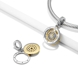 S925 sterling silver spinning wheel evil eye charm with gold plating and cubic zirconia