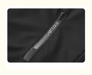 Close-up of waterproof adhesive zipper with HOTCOLD print on men's black sports jacket