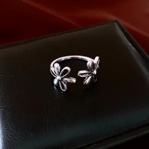 Vintage silver hollow double flower open ring with detailed floral relief pattern