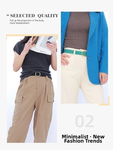 Detail of fashion suede belts in black and cyan with golden buckles for women