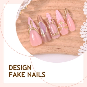 Elegant pink long stiletto fake nails with pearls, stars and 3D metallic line details