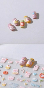 3D embossed nail stickers featuring cute pink pigs, strawberries and cream cake designs
