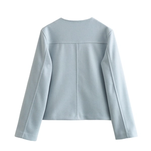 Back view of light blue tweed jacket with round neck design and neat stitching details