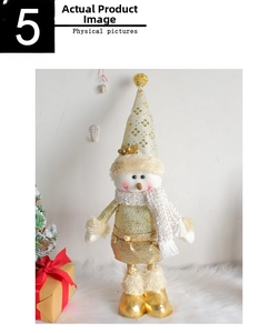 Detailed view of plush snowman decoration with gold sequin hat and white knit scarf
