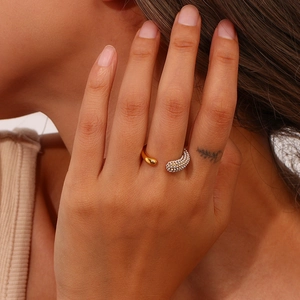 Gold plated stainless steel open ring with water drop design and micro paved pearl accents